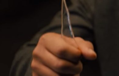 Blade Runner 2036 Screencap--hand holding glass shard